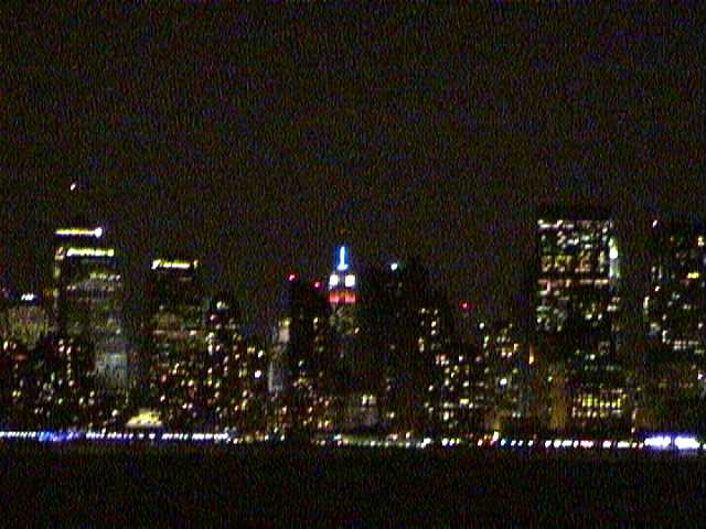 A view from a ferry to the night Manhattan